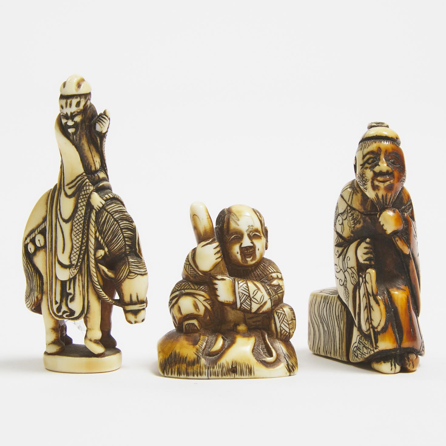 Three Ivory Netsuke Figures of