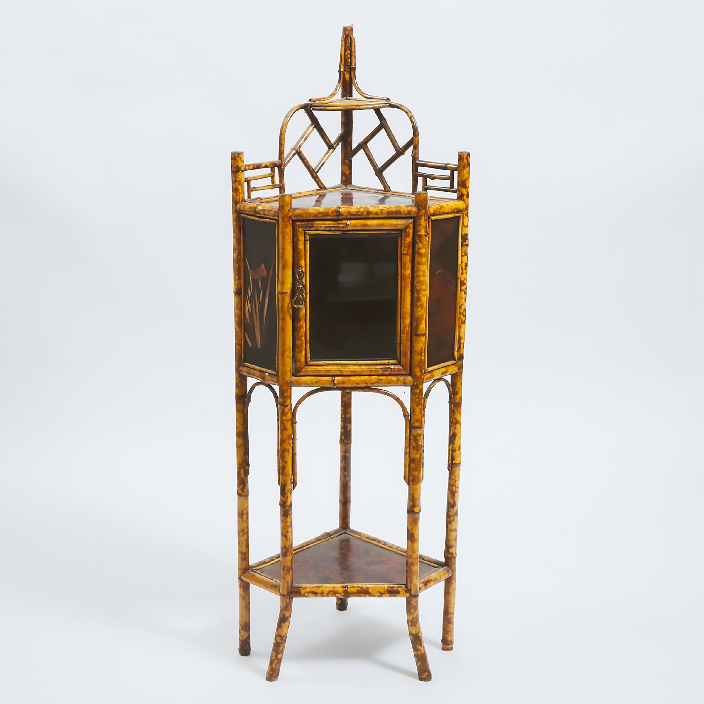 A Lacquered Bamboo Corner Cabinet,