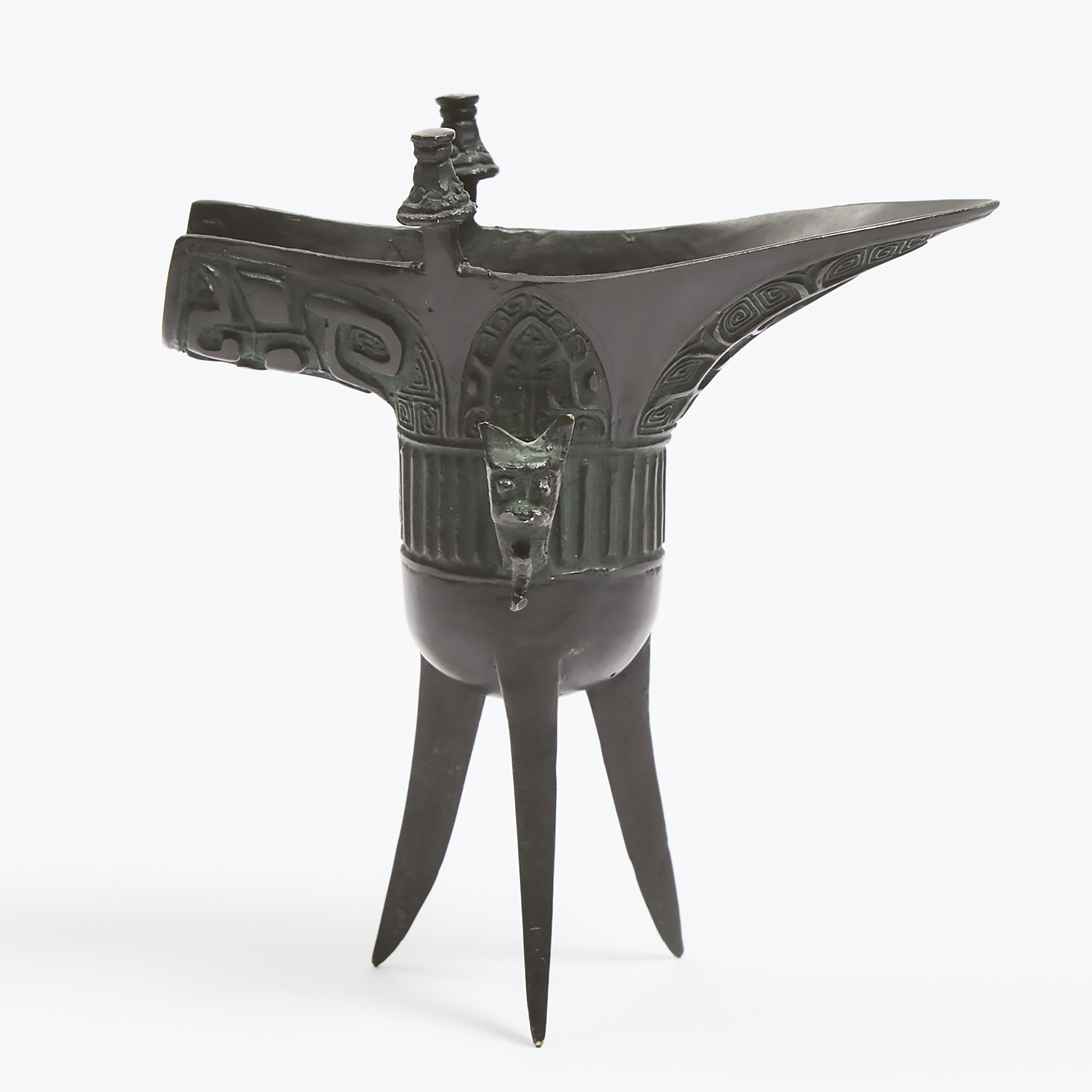 A Bronze Tripod Ritual Wine Vessel,