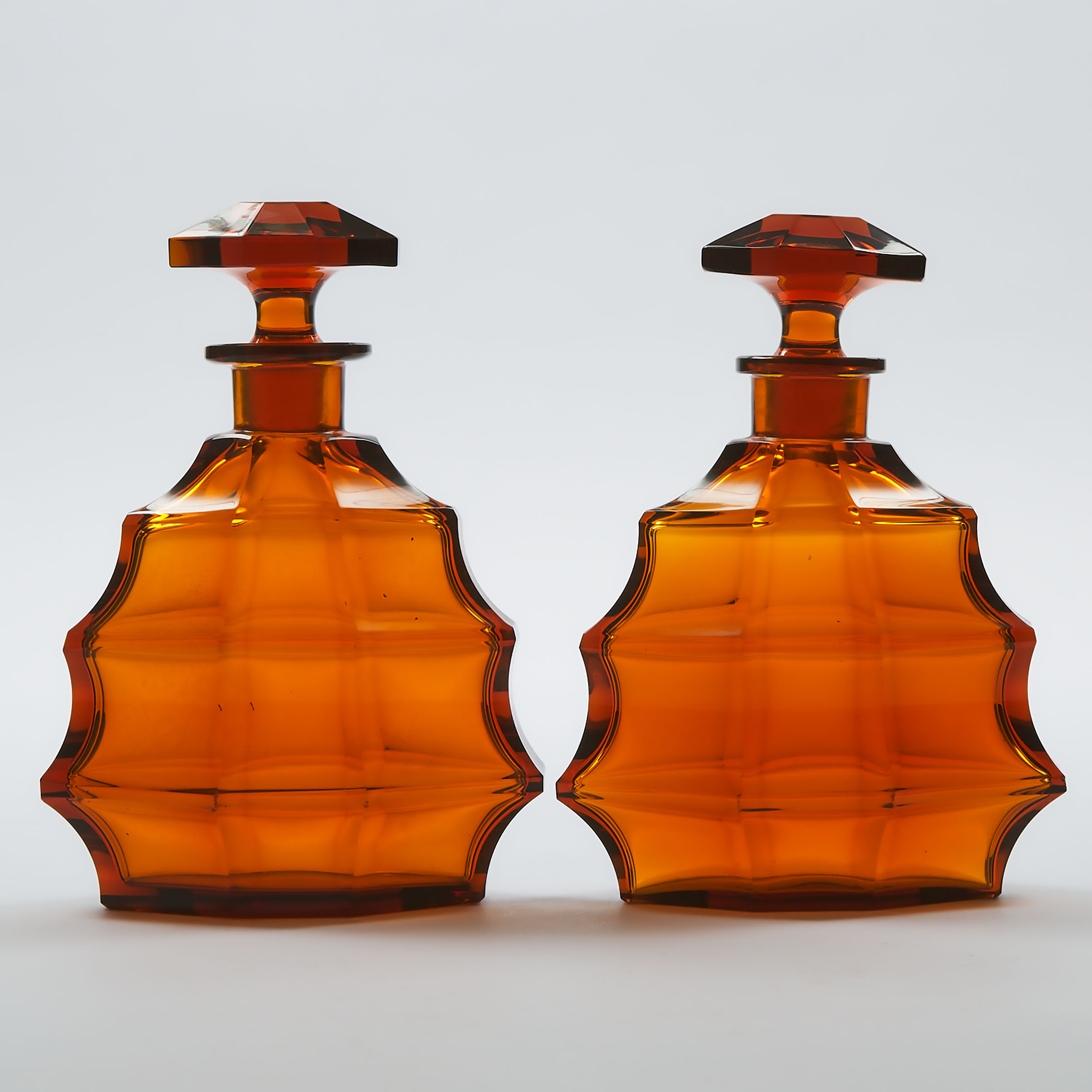 Pair of Moser Cut Amber Glass Decanters  3ac3b7