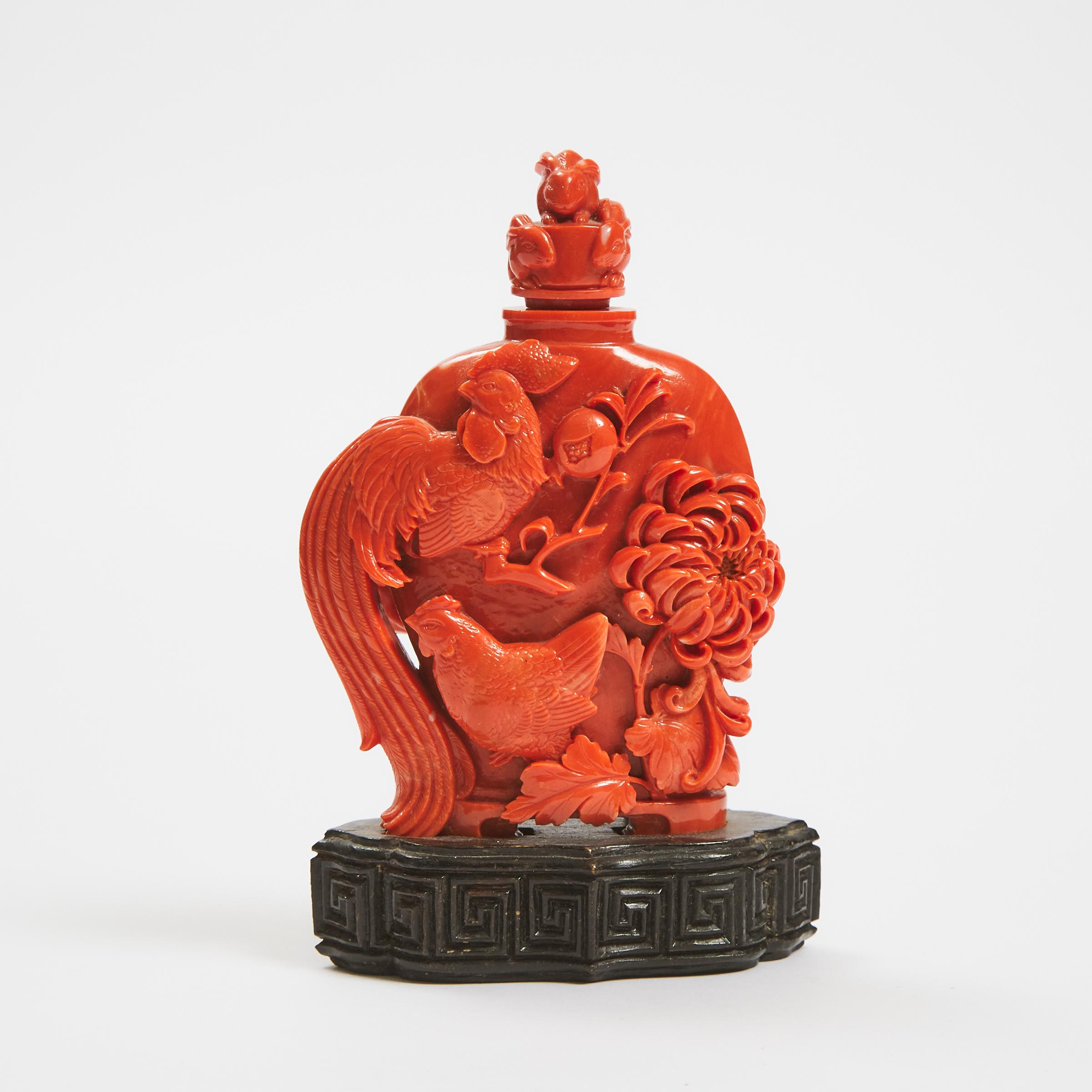 A Large Carved Coral Snuff Bottle,