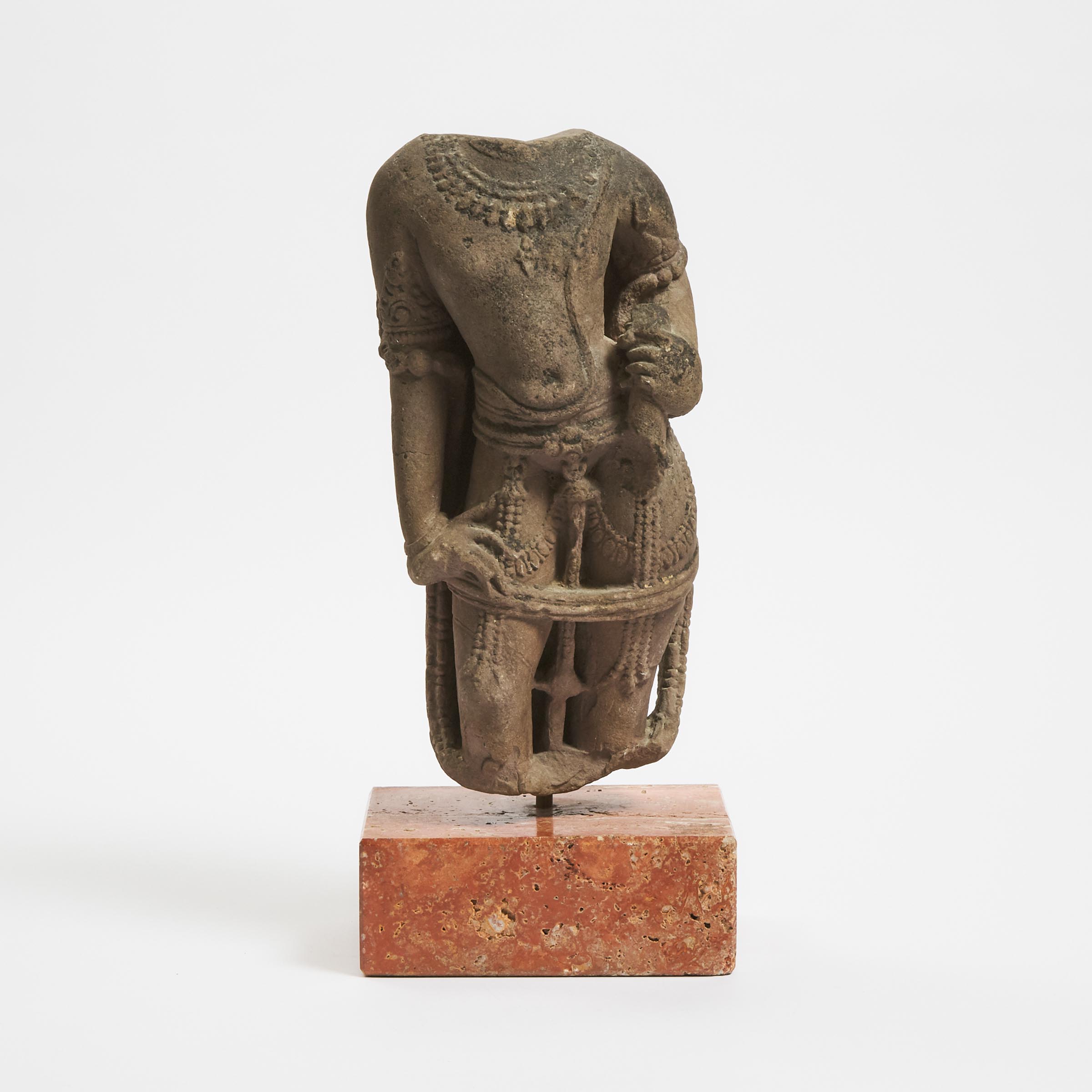 A Stone Torso of a Male Deity,