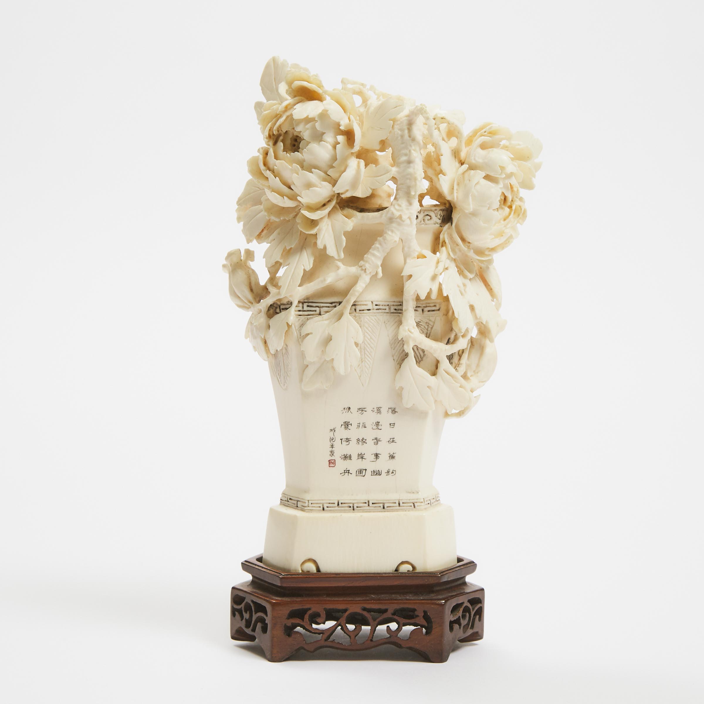 A Carved Ivory Peony Vase, Early to