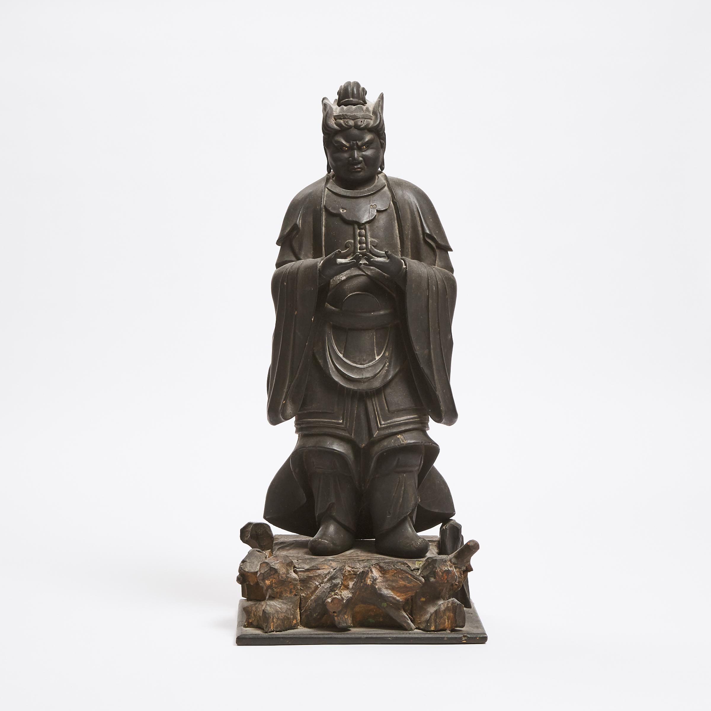 A Black Lacquered Wood Figure of