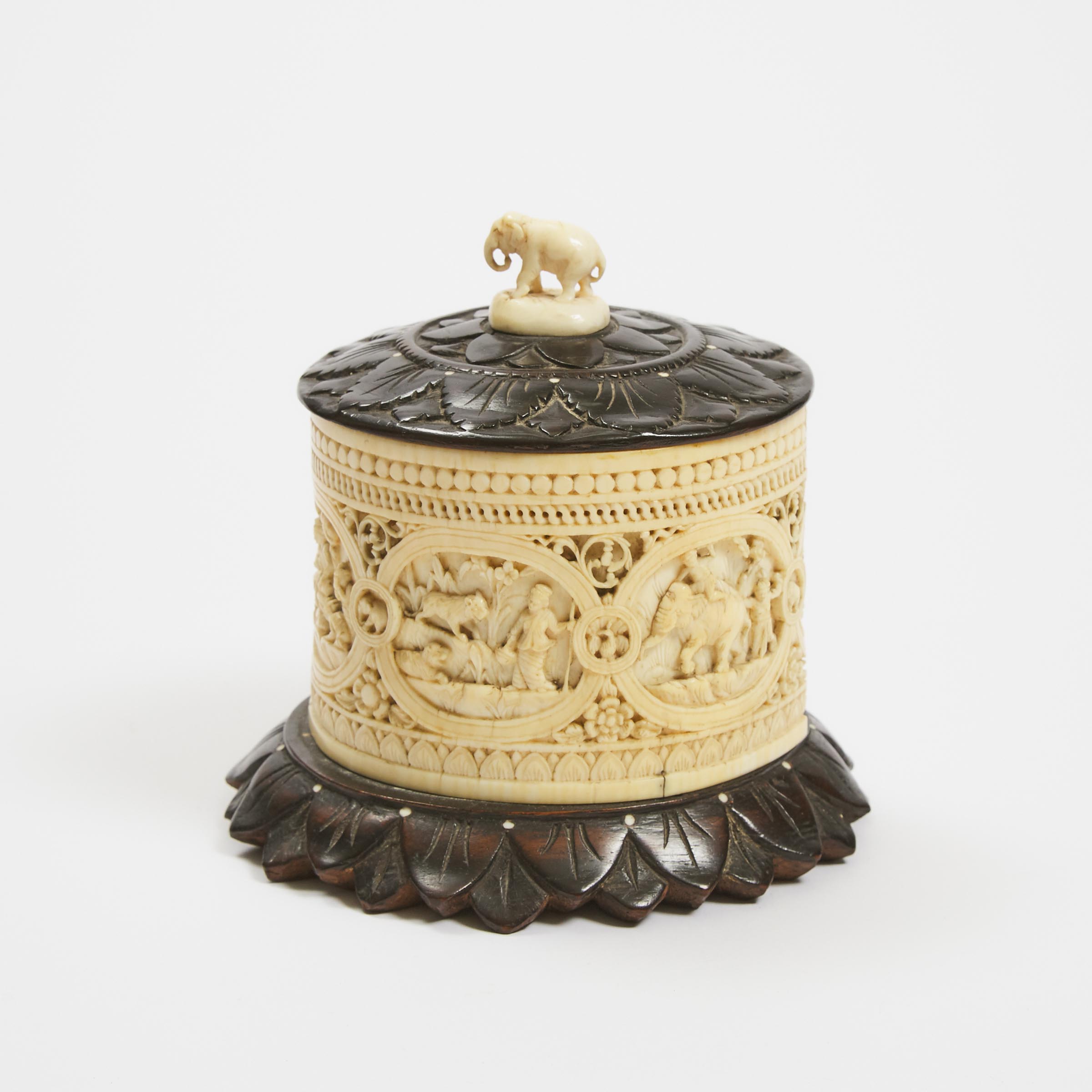 An Ivory Circular Box with Wood