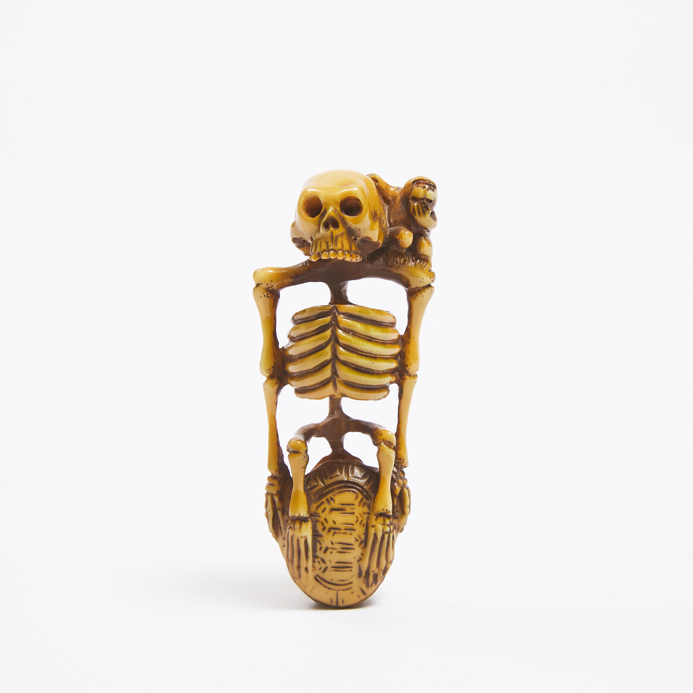 An Ivory Netsuke of a Skeleton, Signed