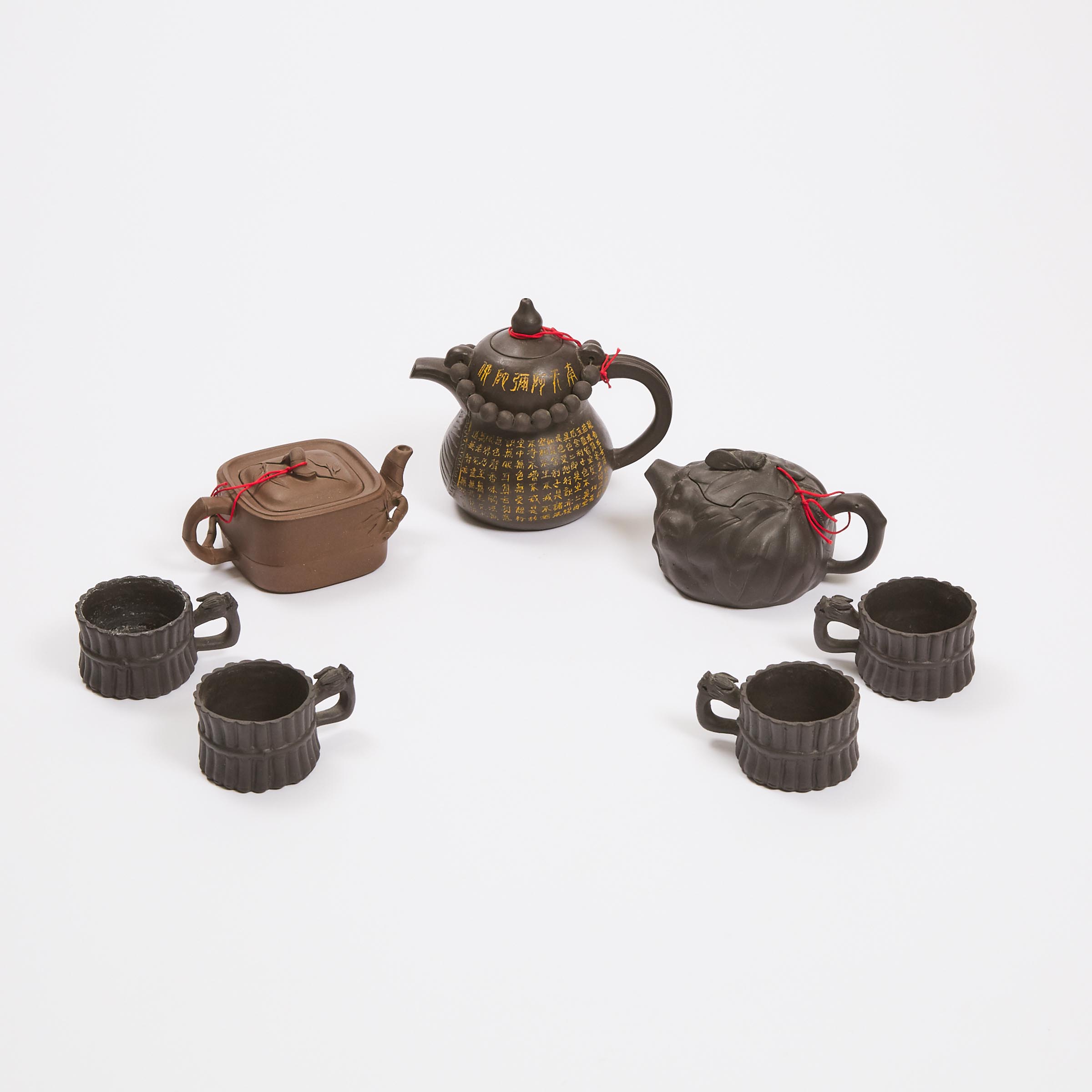 A Group of Three Zisha Teapots  3ac58f