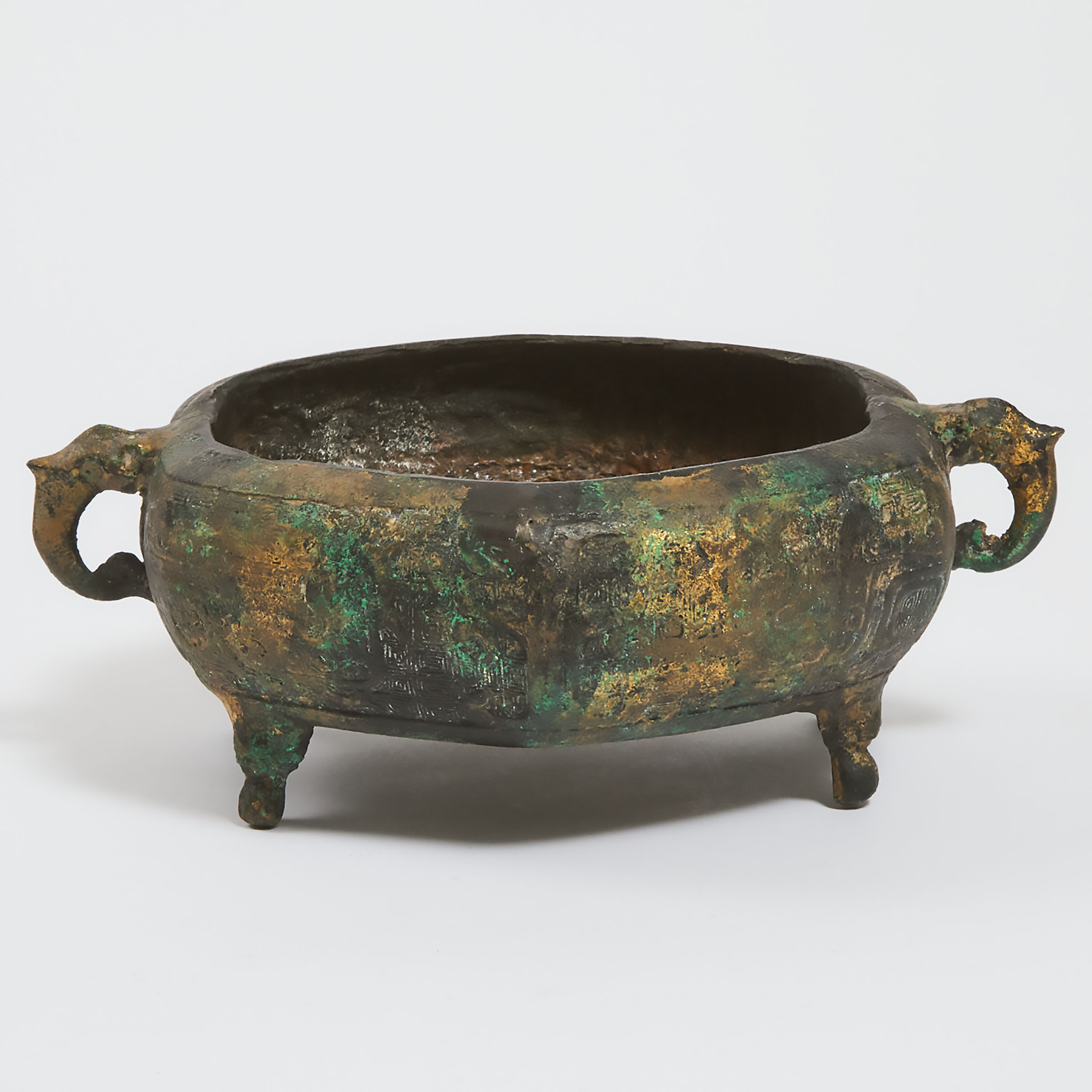 A Bronze Four-Legged Ritual Vessel,