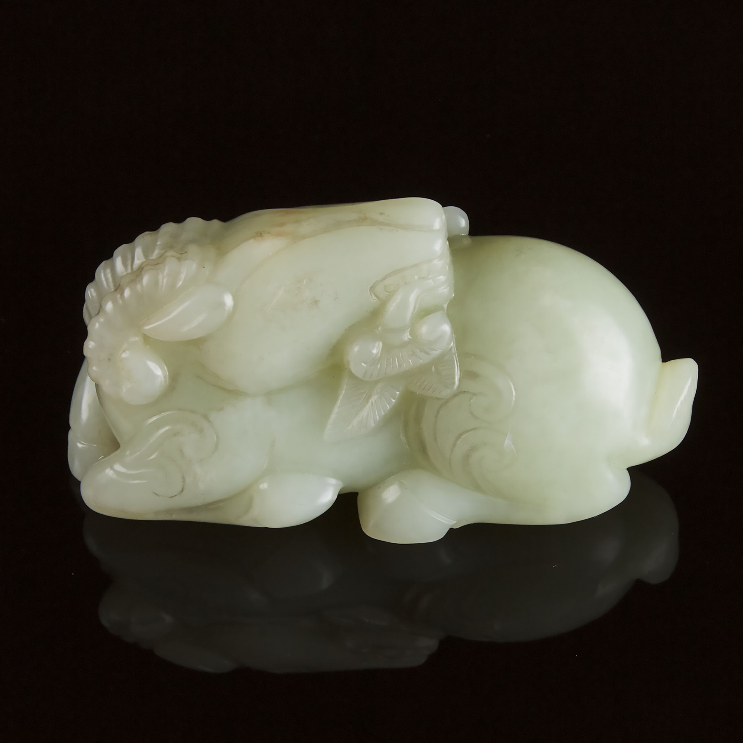 A Pale Celadon Jade Carving of