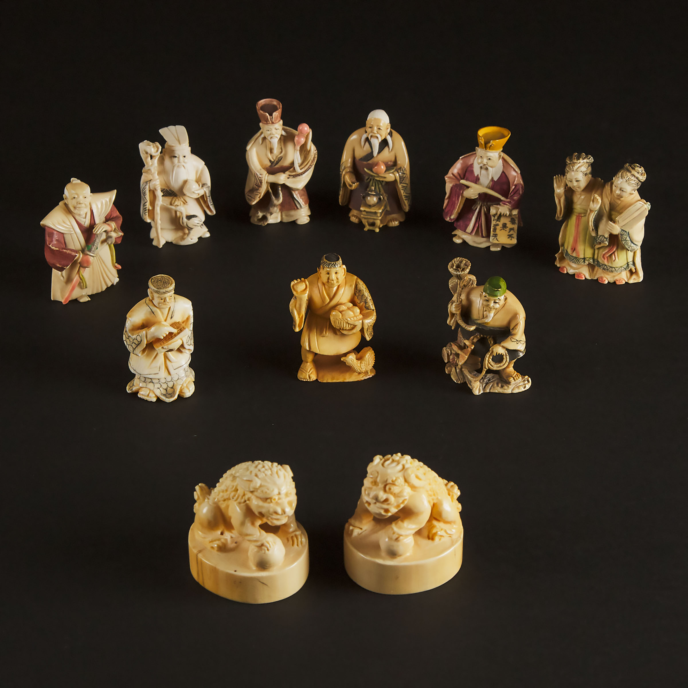 A Group of Nine Ivory Netsuke Figures  3ac72e
