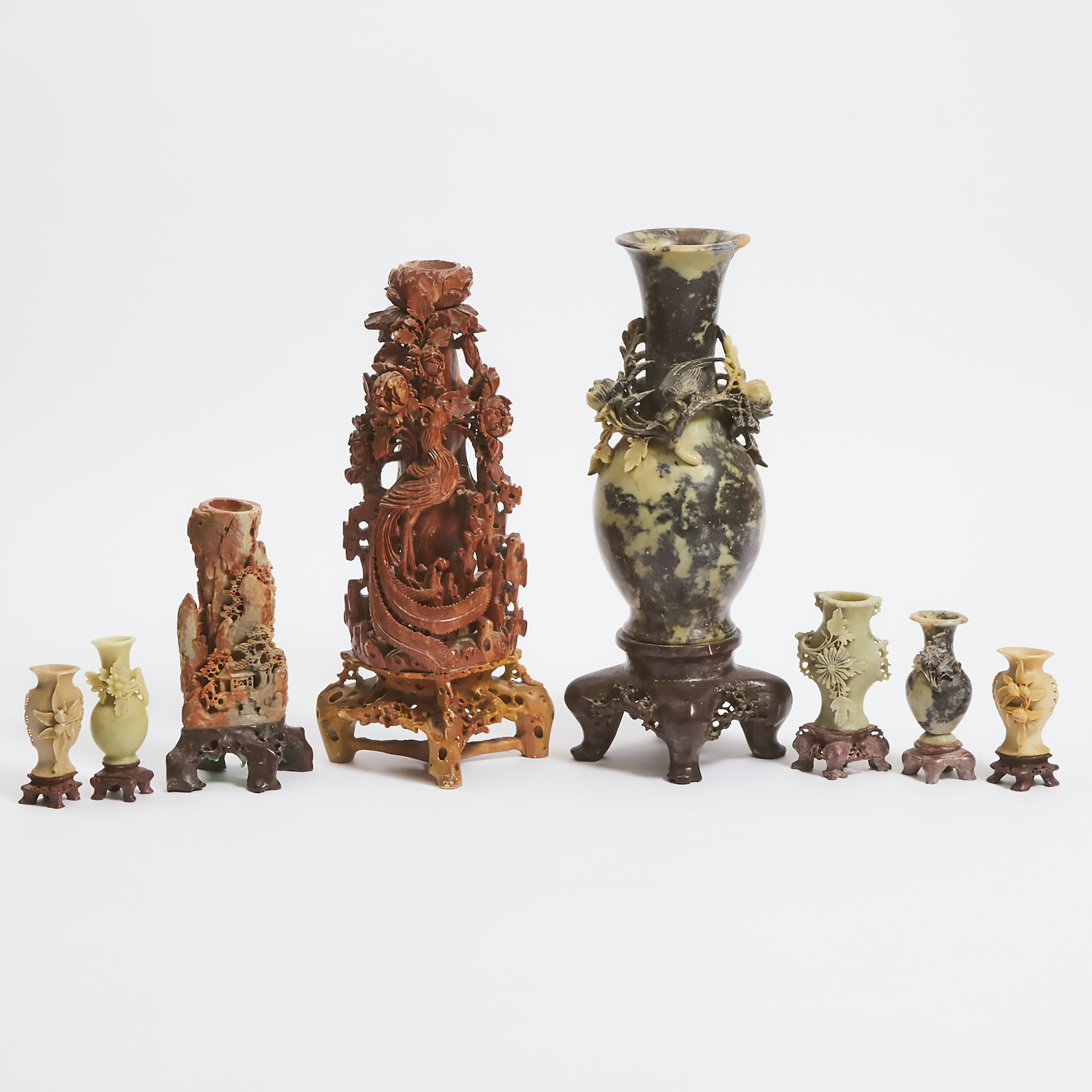 A Group of Eight Chinese Soapstone Carvings,