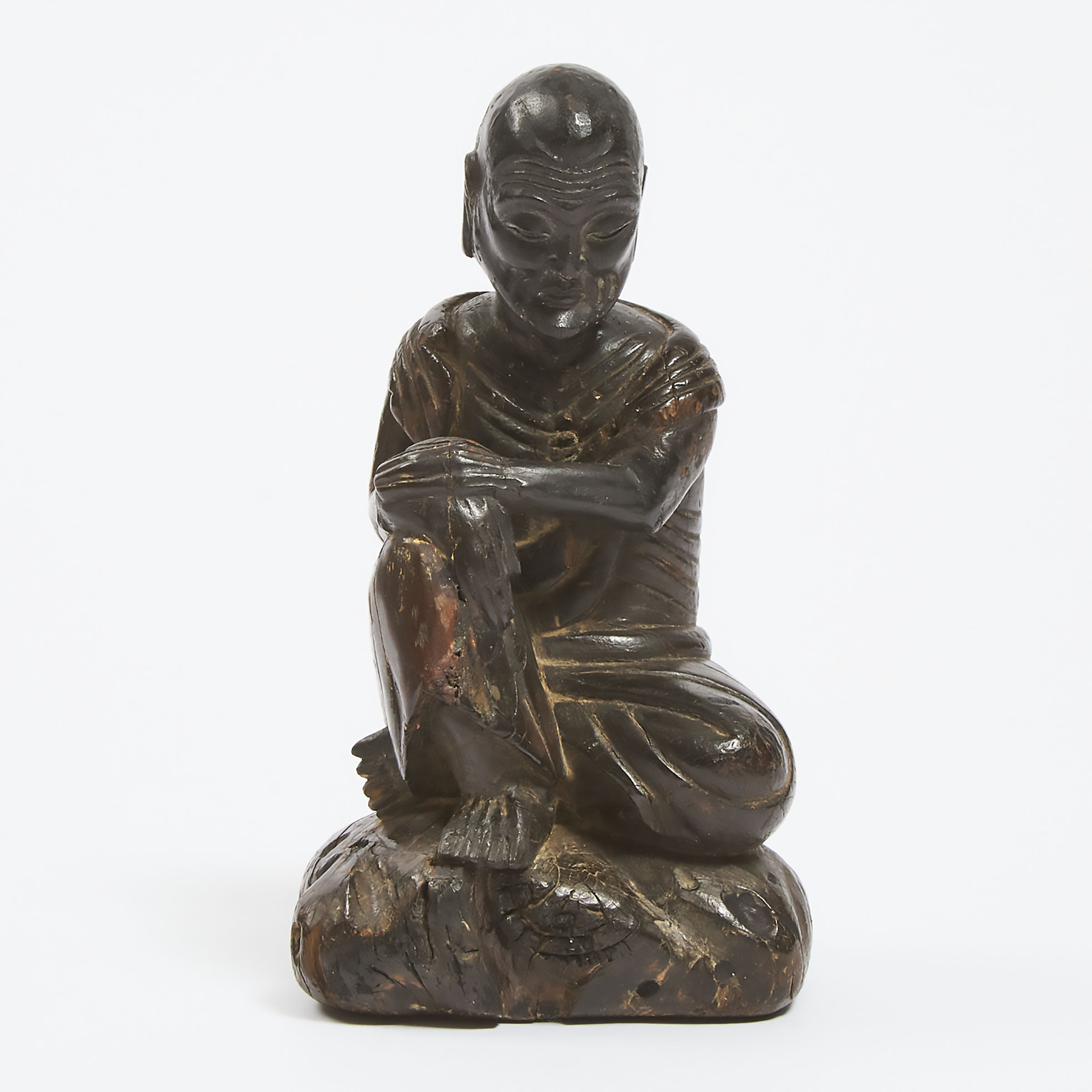 A Wood Carved Figure of a Luohan,