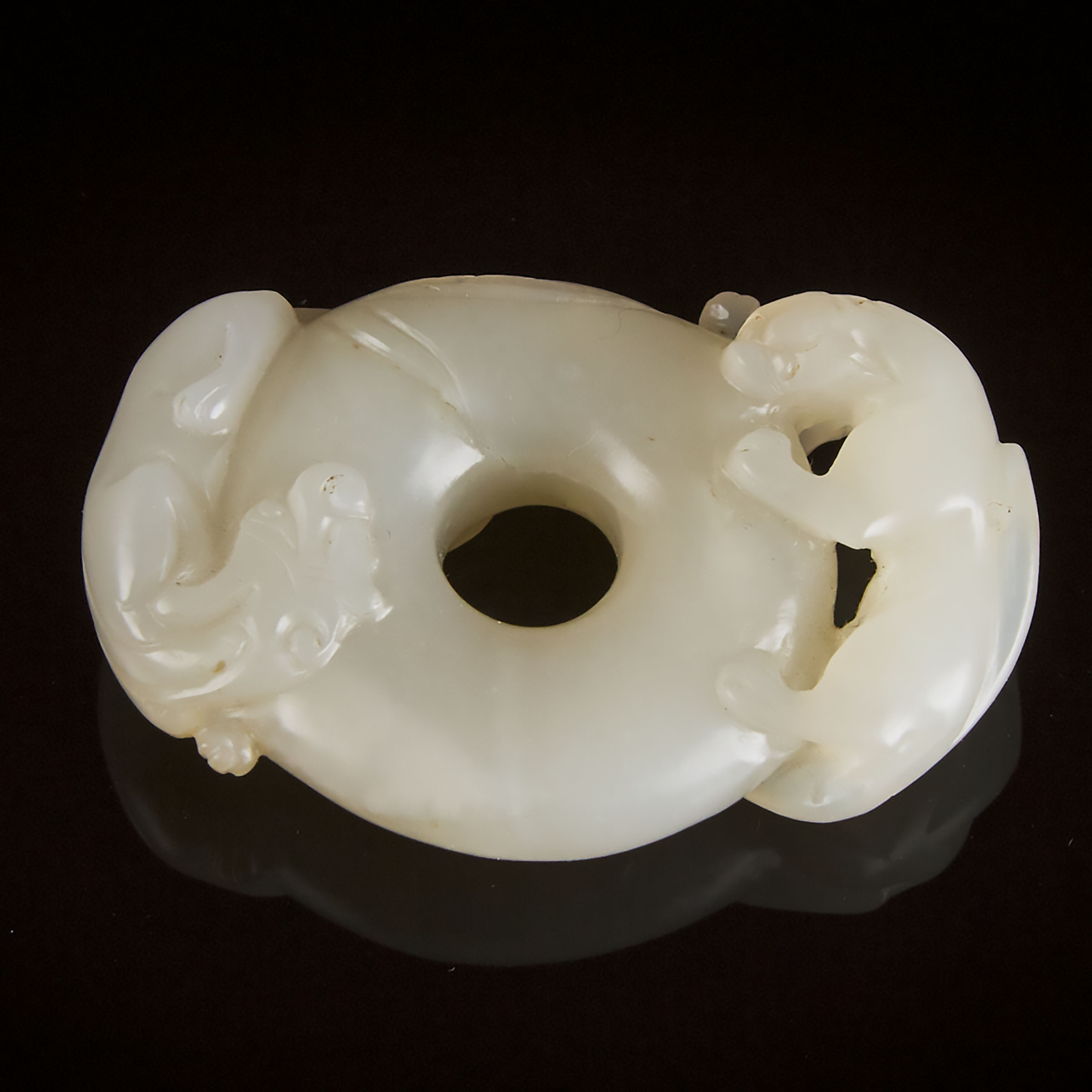 A White Jade Chi Dragon Circular 3ac7b7