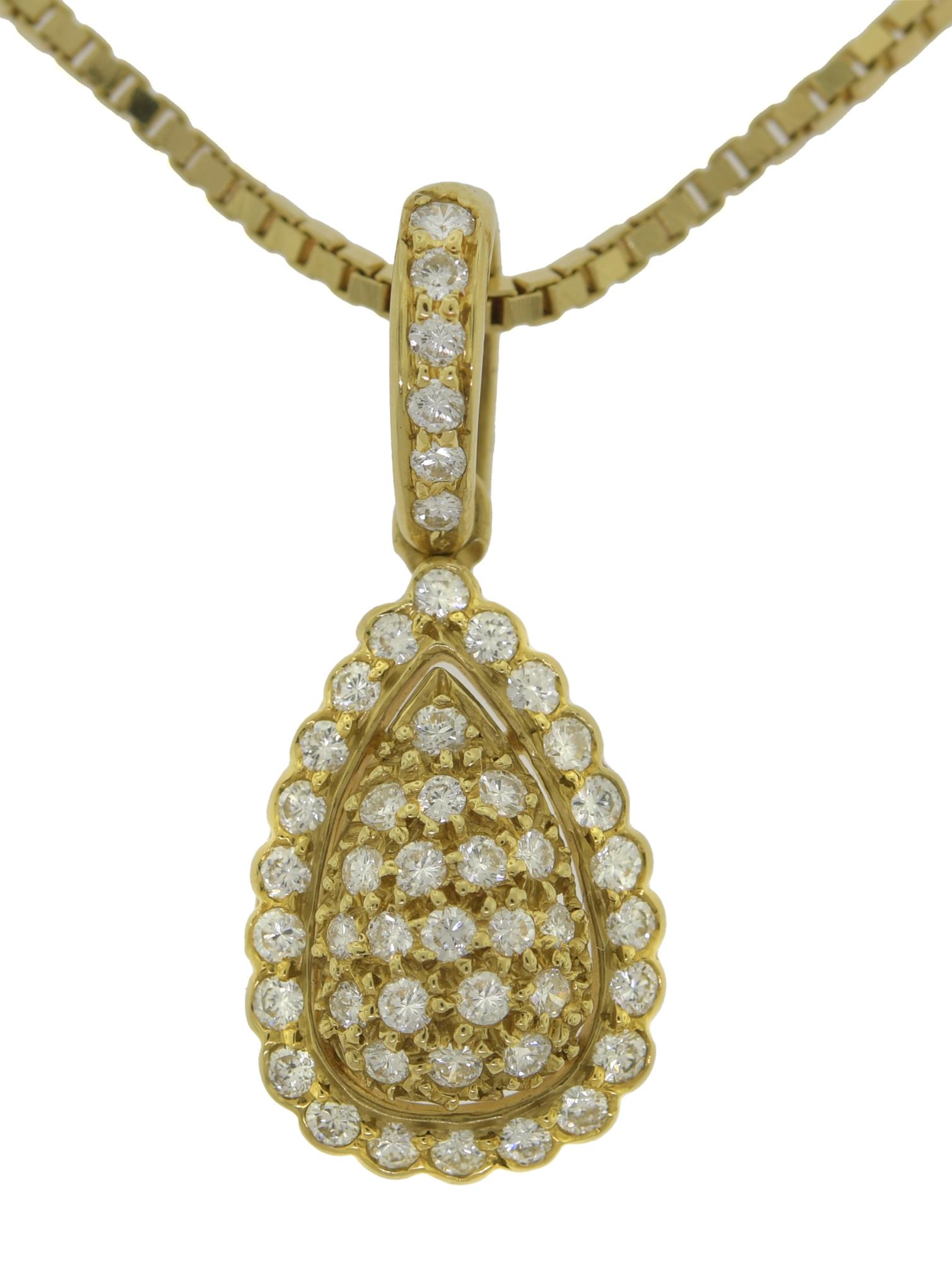 CARTIER 18K GOLD AND DIAMOND PENDANT.