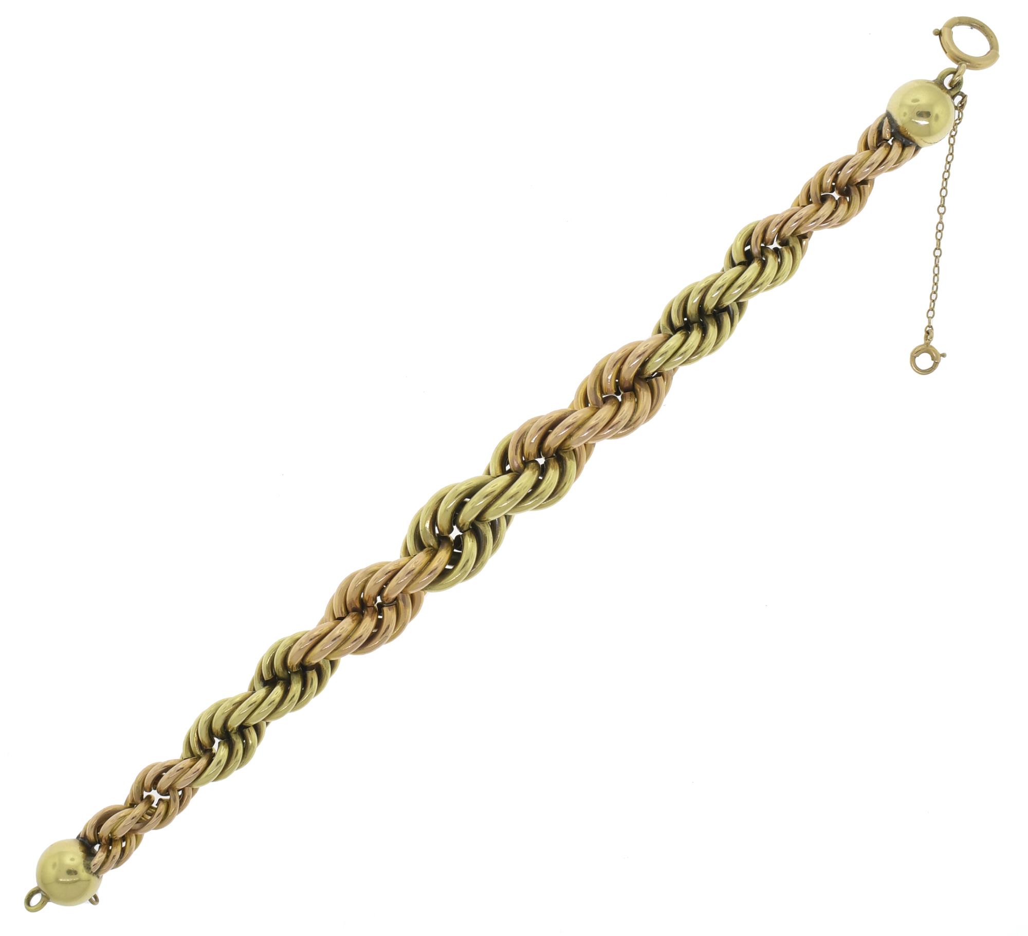 14K YELLOW AND ROSE GOLD ROPE BRACELET.