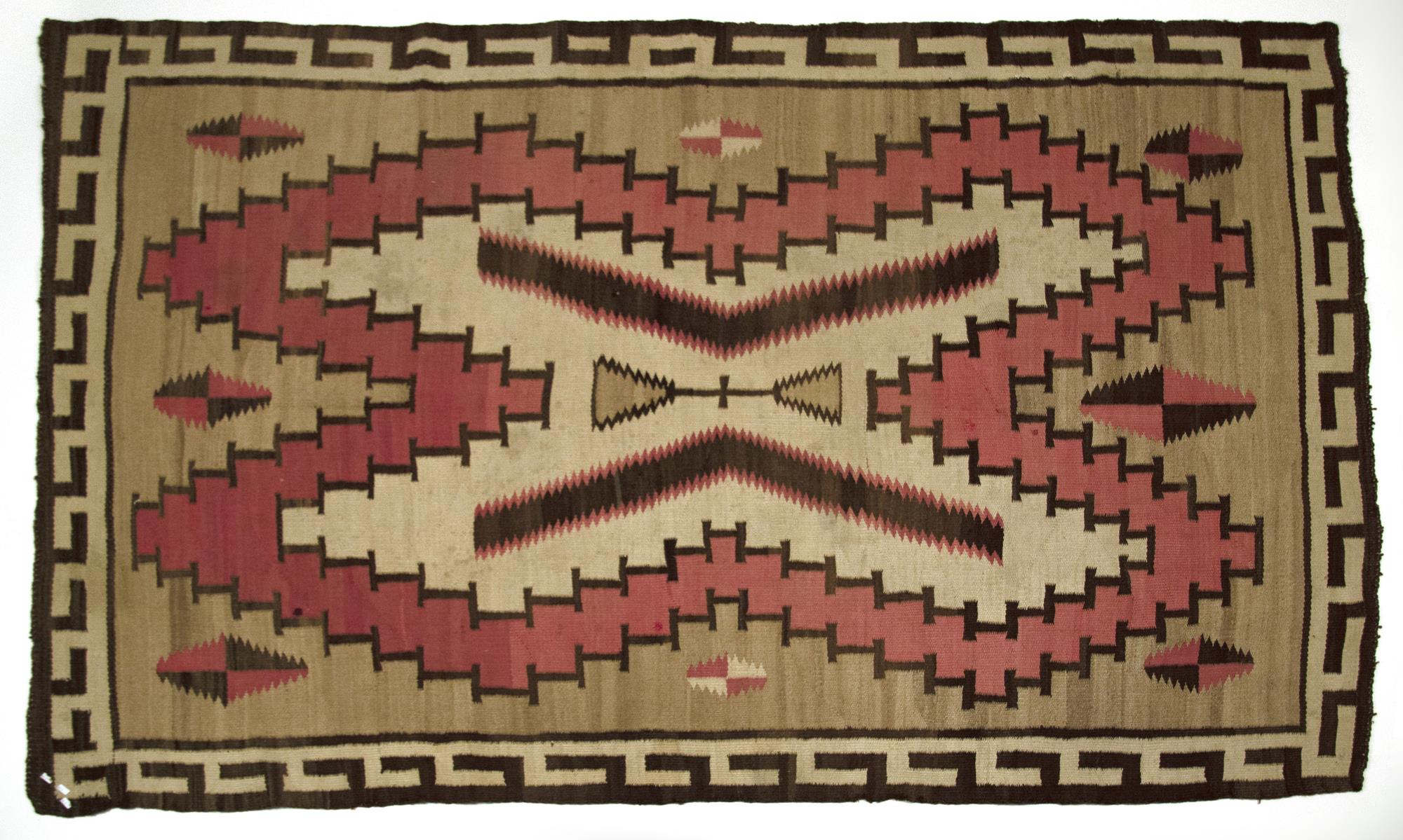 LARGE EARLY 20TH C. NAVAJO RUG.
