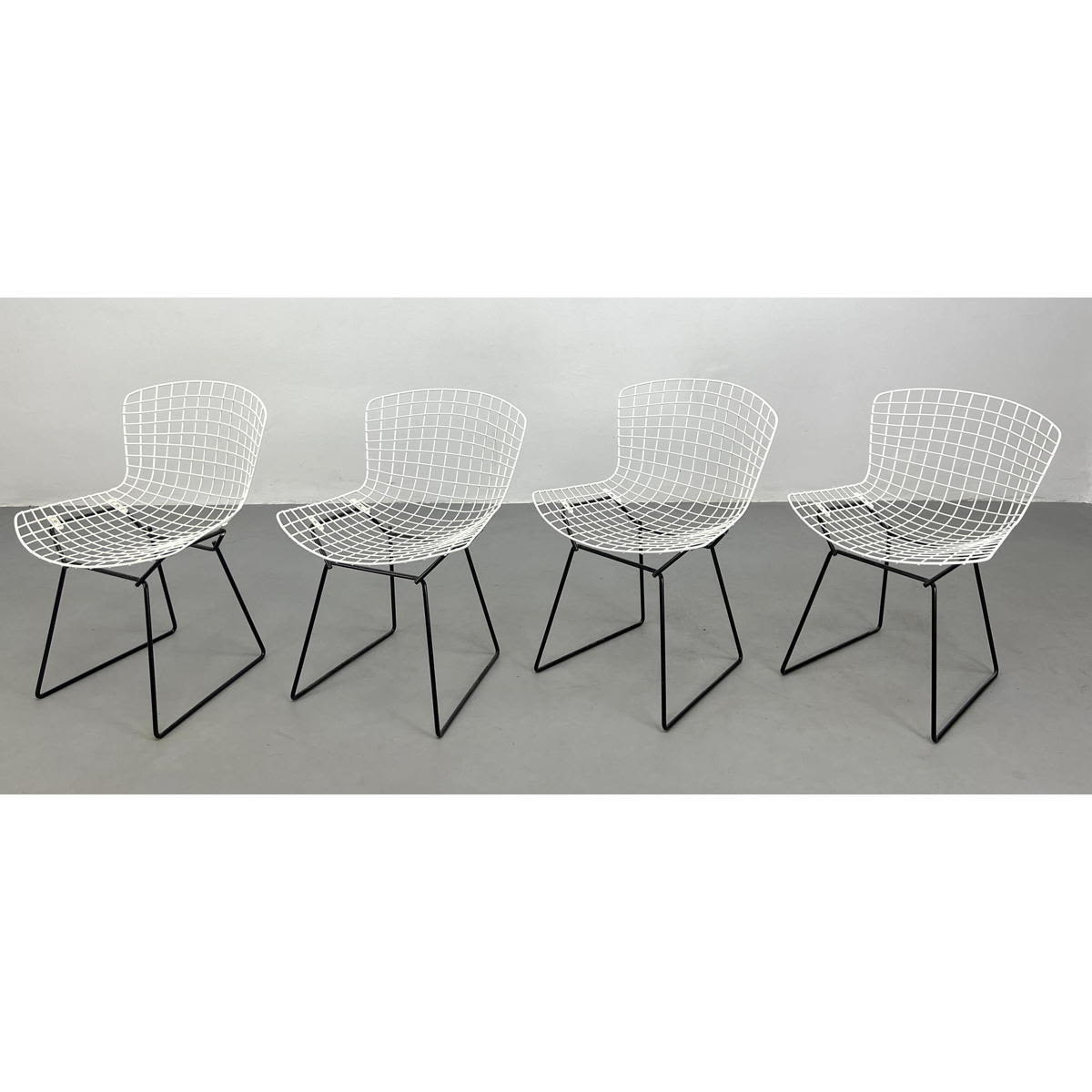 4 vintage Knoll Bertoia wire chairs.