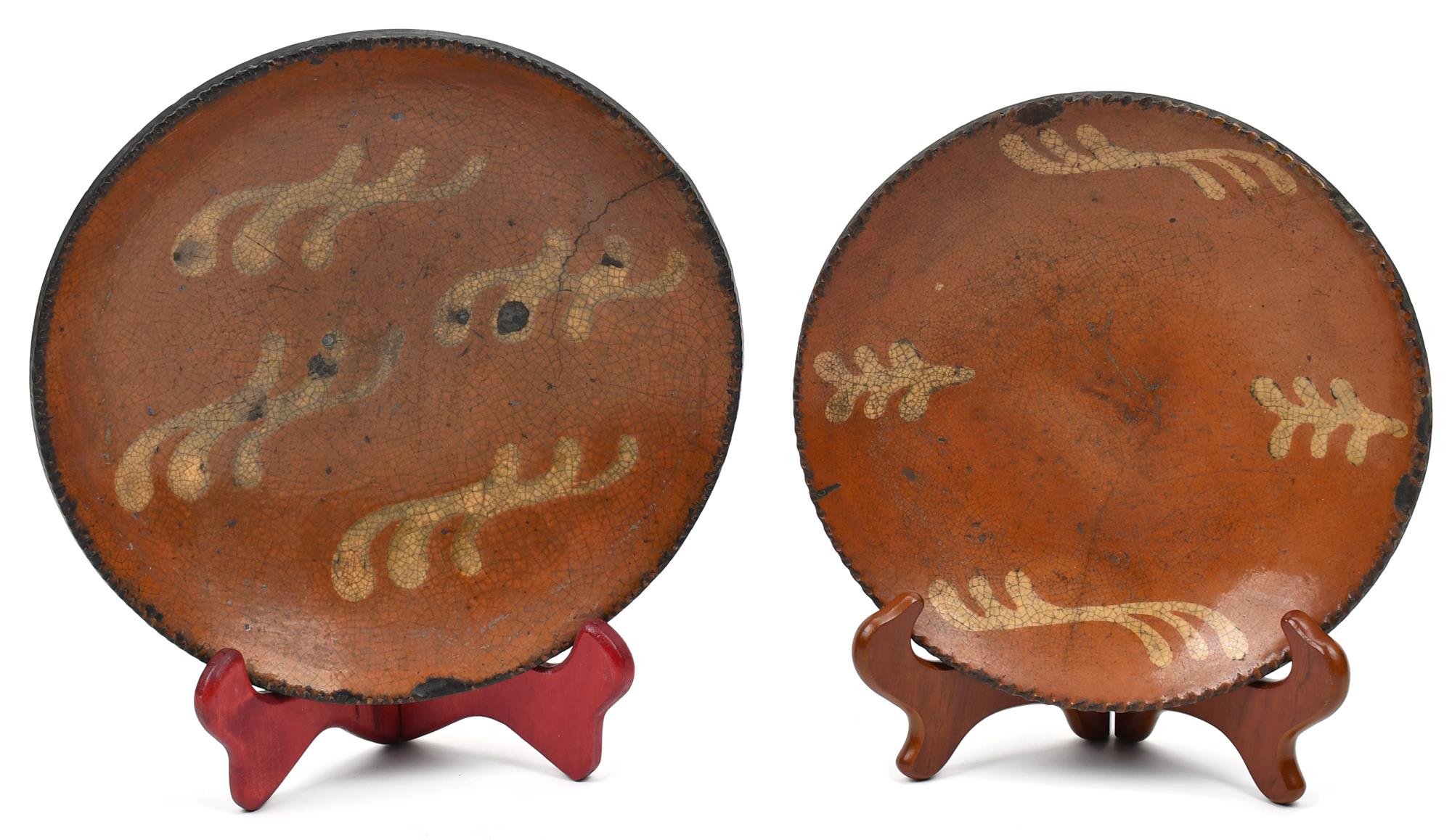 TWO 19TH C. REDWARE PLATES. With