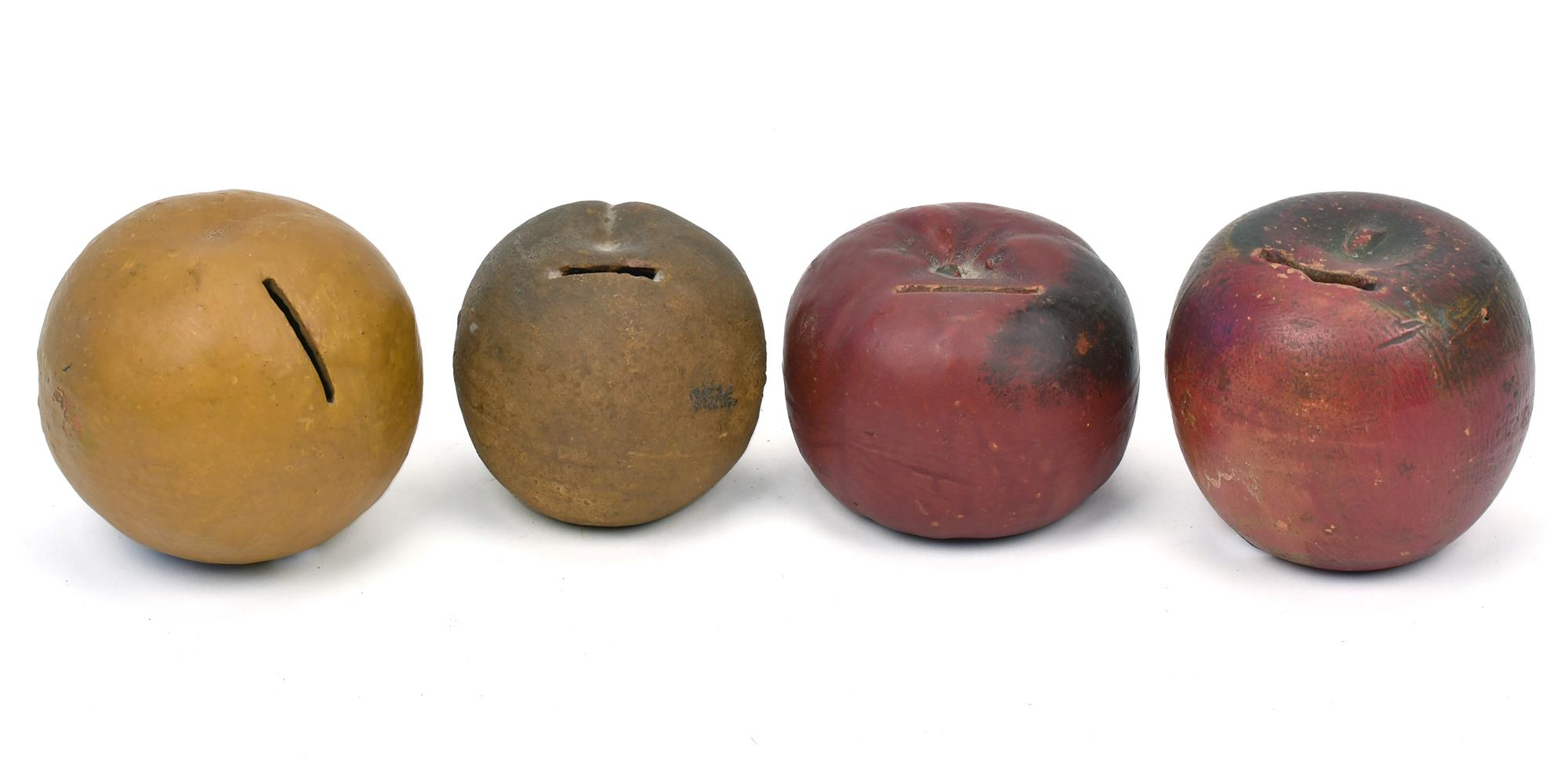 FOUR 19TH C. REDWARE FRUIT BANKS.