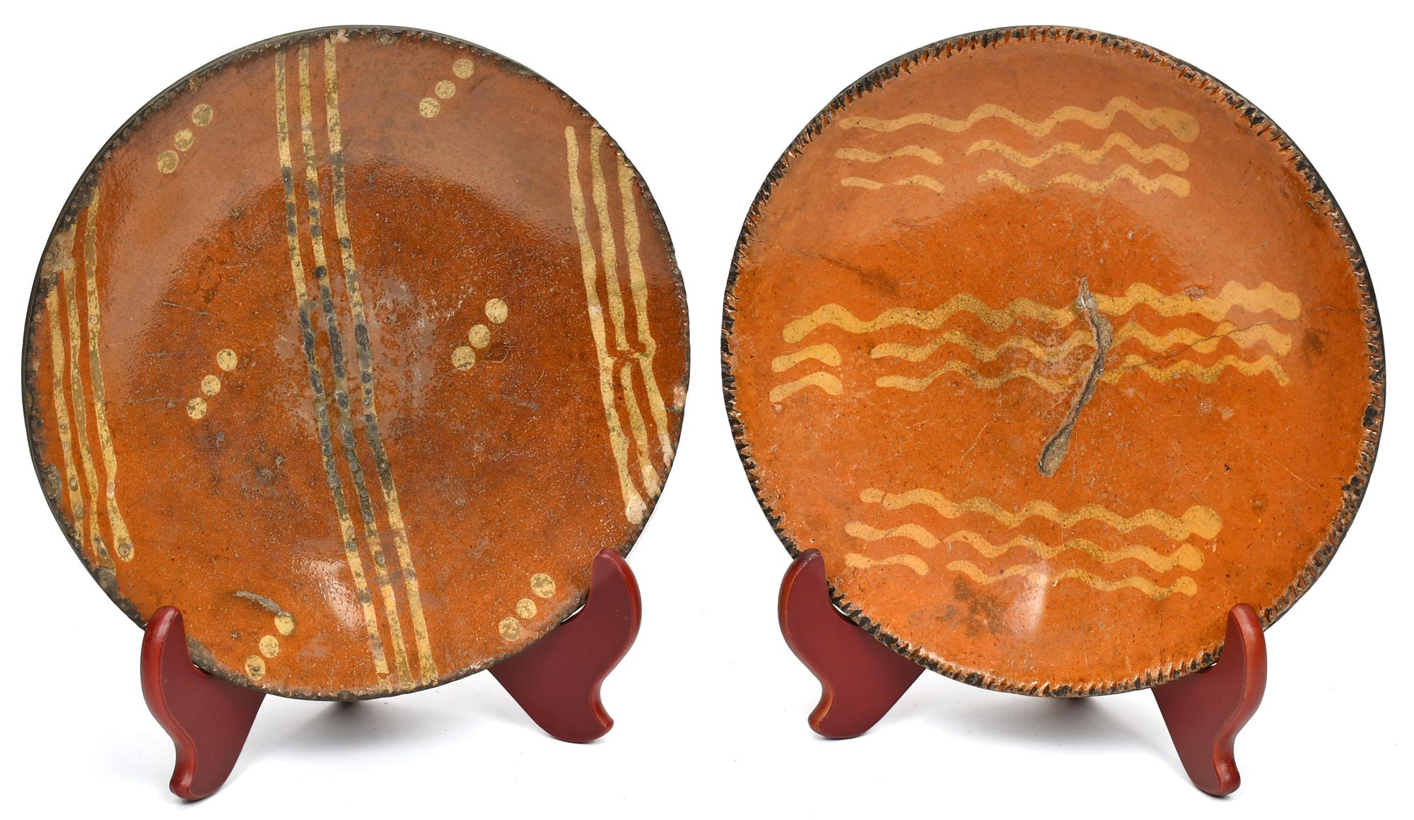 TWO 19TH C. REDWARE SLIPWARE PLATES.