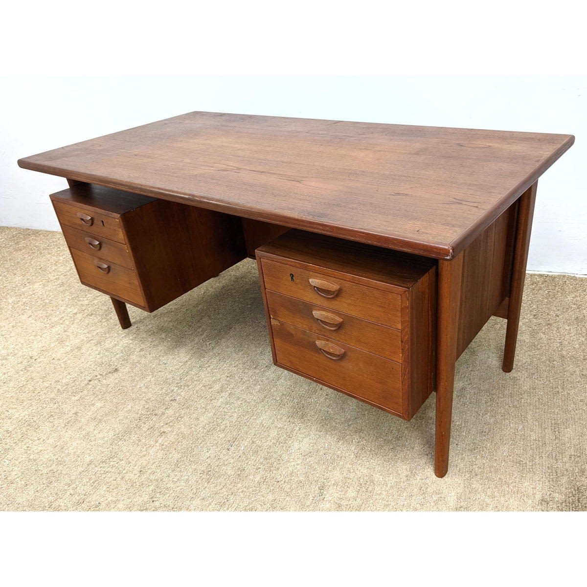 Danish Modern Teak Desk. Suspended cabinets.