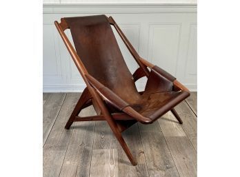 Mid Century low armchair with a