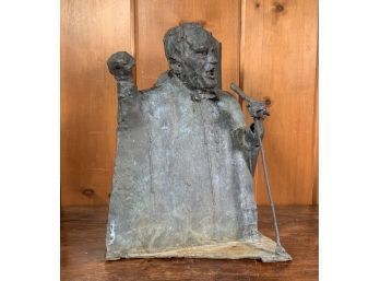 A sculpture of a man with microphone,