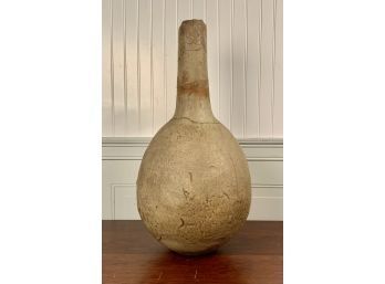 An artisan made gourd form vessel