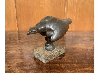 A small bronze sculpture of eagle