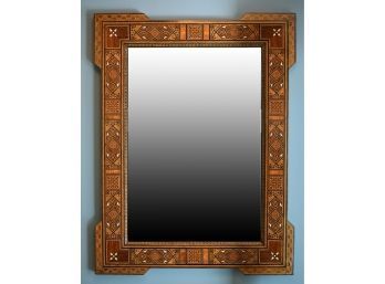 An inlaid wall mirror with fine