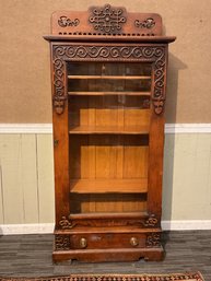 A ca. 1890 carved oak bookcase