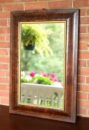 A ca. 1850 Empire wall mirror with