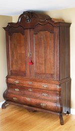 A 19th C. three-part oak wardrobe/press,