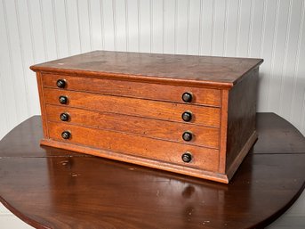 Antique oak spool cabinet with four