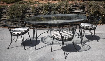 A black painted iron patio dining