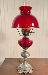 A pewter table lamp from the first