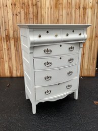 An antique white painted pine tall chest,