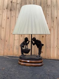 A antique cast bronze table lamp