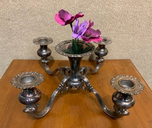 A sterling centerpiece with four 3b023e