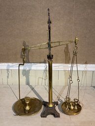 A large 19th C. brass and iron balance