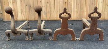 Two sets of antique iron andirons, one