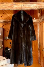 A ladies full length mink coat,