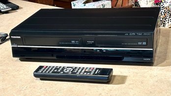 Toshiba DVD and VHS player, with remote.