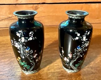 A pair of vintage black Cloisonne vases