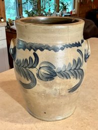 A 19th C. stoneware crock with blue