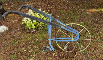 Antique garden cultivator used as a