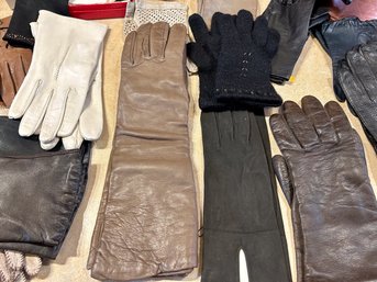 Thirty pairs of ladies leather and suede