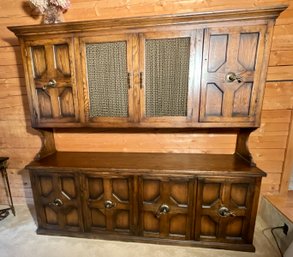 A vintage two part china cabinet, with