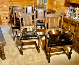 A set of six vintage oak dining chairs