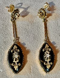 A pair of 14k gold onyx pierced 3b0318